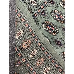 Persian Tekke Bokhara green ground runner rug 