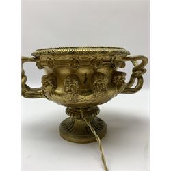 19th century Grand Tour gilt bronze campagna urn or Warwick vase, decorated in relief with a band of classical male and female masks, the handles modelled as twisted vines leading to a fruiting vine beneath a beaded and lobed rim, upon a fluted socle base, H16.5cm 
