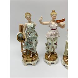 A group of five Continental figurines modelled as the arts, emblematic of music, painting, sculpture, literature, and theatre, each with spurious blue cross mark beneath, H22.5cm. (5). 