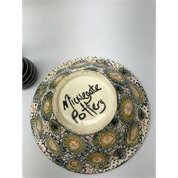 A group of assorted Studio Pottery, to include various Cornish Celtic Pottery, Wold pottery bowl, Micklegate pottery bowl, a small Troika style vase of cylindrical form, etc. 