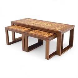 Mid-20th century ‘Long John’ teak nest of coffee tables, rectangular form with ceramic tile inset top, enclosing two smaller square tables with matching tile decoration