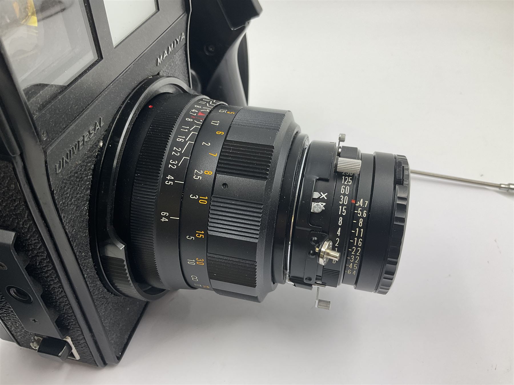 Mamiya Universal camera body, serial no. A87210, with 'Mamiya - Sekor P 1:4.7 f=127mm' lens, serial no. 31476 and Mamiya 6x9 roll film adapter