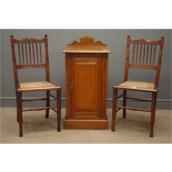  Early 20th century oak bedside cabinet, raised shaped back, single panelled door, plinth base, (W44cm, H85cm, D37cm) and two mahogany bedroom chairs with caned seats, turned supports  