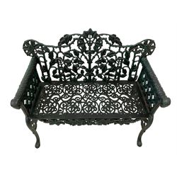 Victorian design cast iron bench, tailing oak leaf and branch pattern, rams head arm terminals