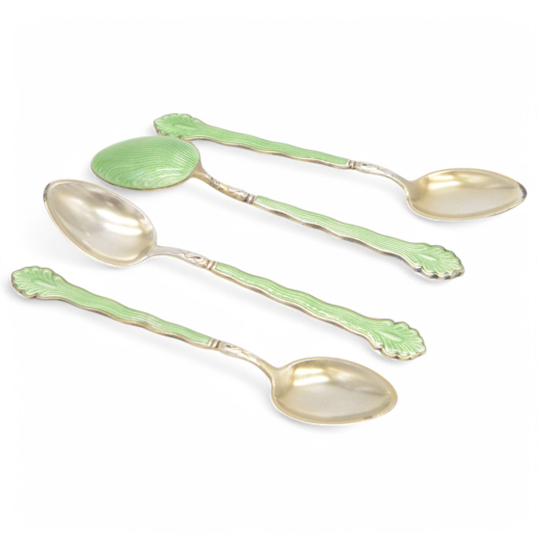 Set of six Scandinavian silver demitasse spoons decorated with green guilloche enamel, stamped 925s, together with a similar Scandinavian silver spoon in yellow guilloche enamel and 1950's silver christening cup, hallmarked J B Chatterley & Sons Ltd, Birmingham 1959, cup H7cm  