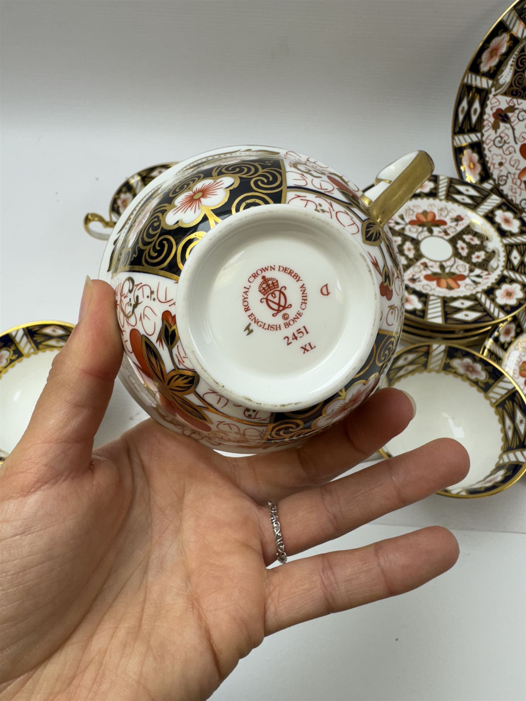 Royal Crown Derby Imari pattern 2451, four teacups, six saucers, six dessert plates etc 