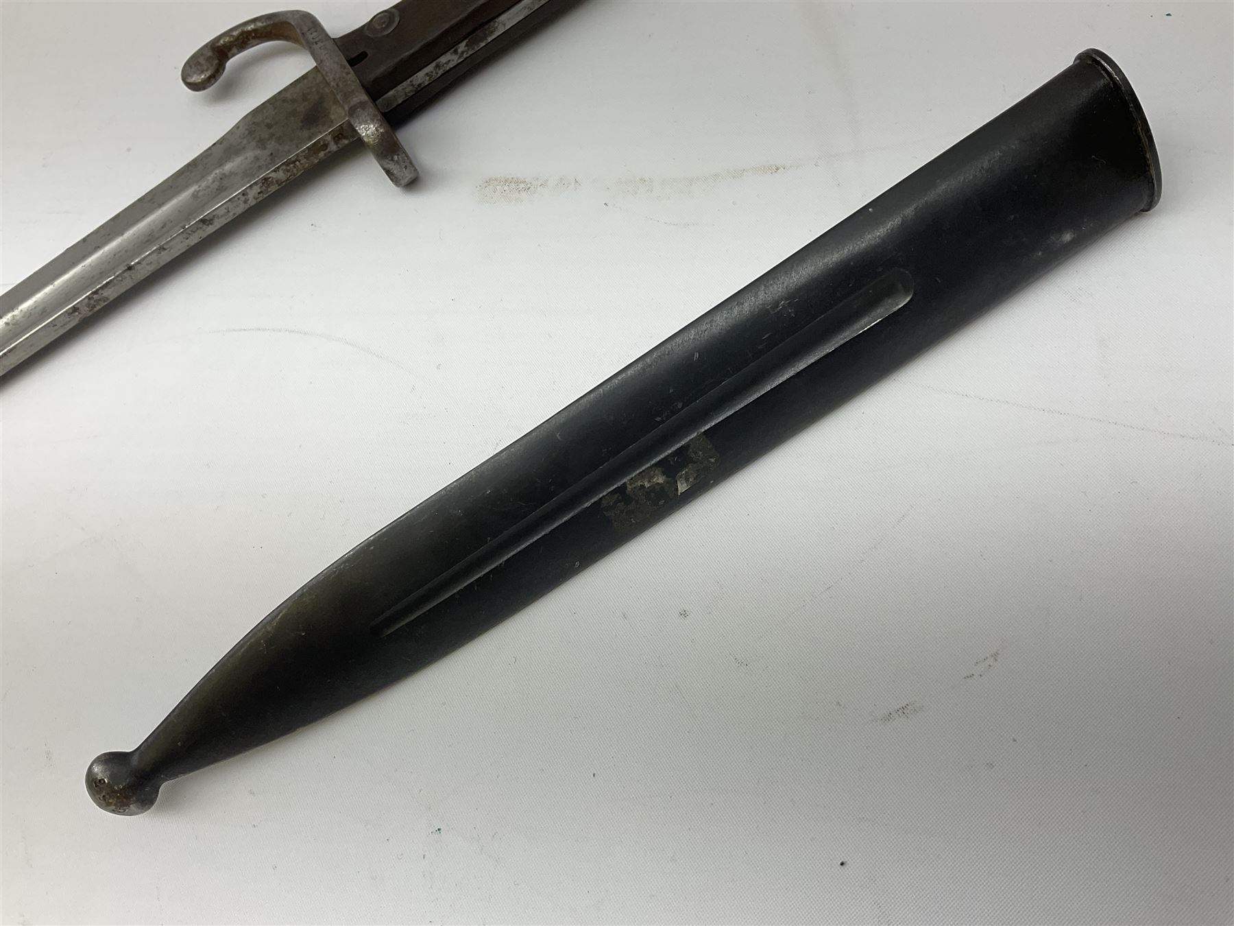 German-made 1908 pattern bayonet by Weyersberg, Kirschbaum & Co, Solingen as used by the Brazilian Army, with 30cm fullered steel blade and hooked quillon numbered 107011 L43cm overall; and Swedish Carl Gustav M1896 Mauser knife bayonet with 21cm steel blade and machined steel grip; in metal scabbard, both numbered 299 L35cm overall (2)