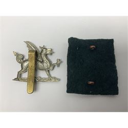 Fourteen cap badges of Irish interest including Royal Dublin Fusiliers inscribed to the slider 'From A. O'Connor 2nd Batt. Dec.2nd 1915', Connaught Rangers, South irish Horse Yeomanry, Inniskilling Fusiliers, Royal Irish Regiment etc; and seven Welsh badges including South Wales Borderers, Welsh Guards, 3rd Bn. Monmouthshire Regt. etc (21)