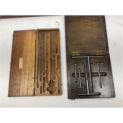 Two boxed stock and die sets to include a Presto example, together with other tools including a cased bore gauge set, five brass mounted spirit levels and a Cramptons Climax steel sash clamp stamped 1879