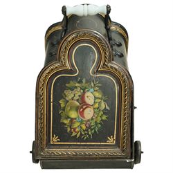 Victorian toleware coal scuttle, of shaped form hand-painted with fruit and floral spray to the hinged lid, with gilt line detailing, ceramic handle raised on wheels, brass coal shovel