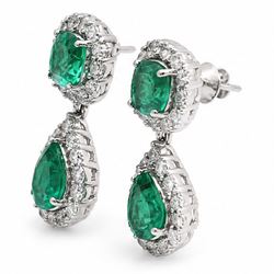 Pair of 18ct white gold emerald and diamond pendant earrings, each stud set with a cushion cut emerald and round brilliant cut diamond surround, suspending a further pear cut emerald and diamond cluster stamped, total emerald weight approx 3.45 carat, total diamond weight approx 1.70 carat