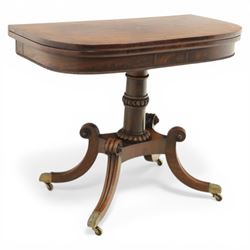 Early 19th century Regency mahogany fold over card table, the rounded rectangular top with...