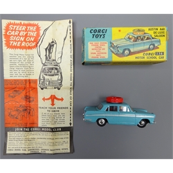  Corgi Austin A60 De Luxe Saloon Motor School Car No.236, blue with red interior containing two figures and roof top steering wheel, boxed with instructions  