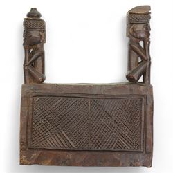 Australian Aboriginal boomerang decorated with eucalyptus leaves, a plain boomerang,  African wood and iron lamellophone and a carved wood tablet with two figures