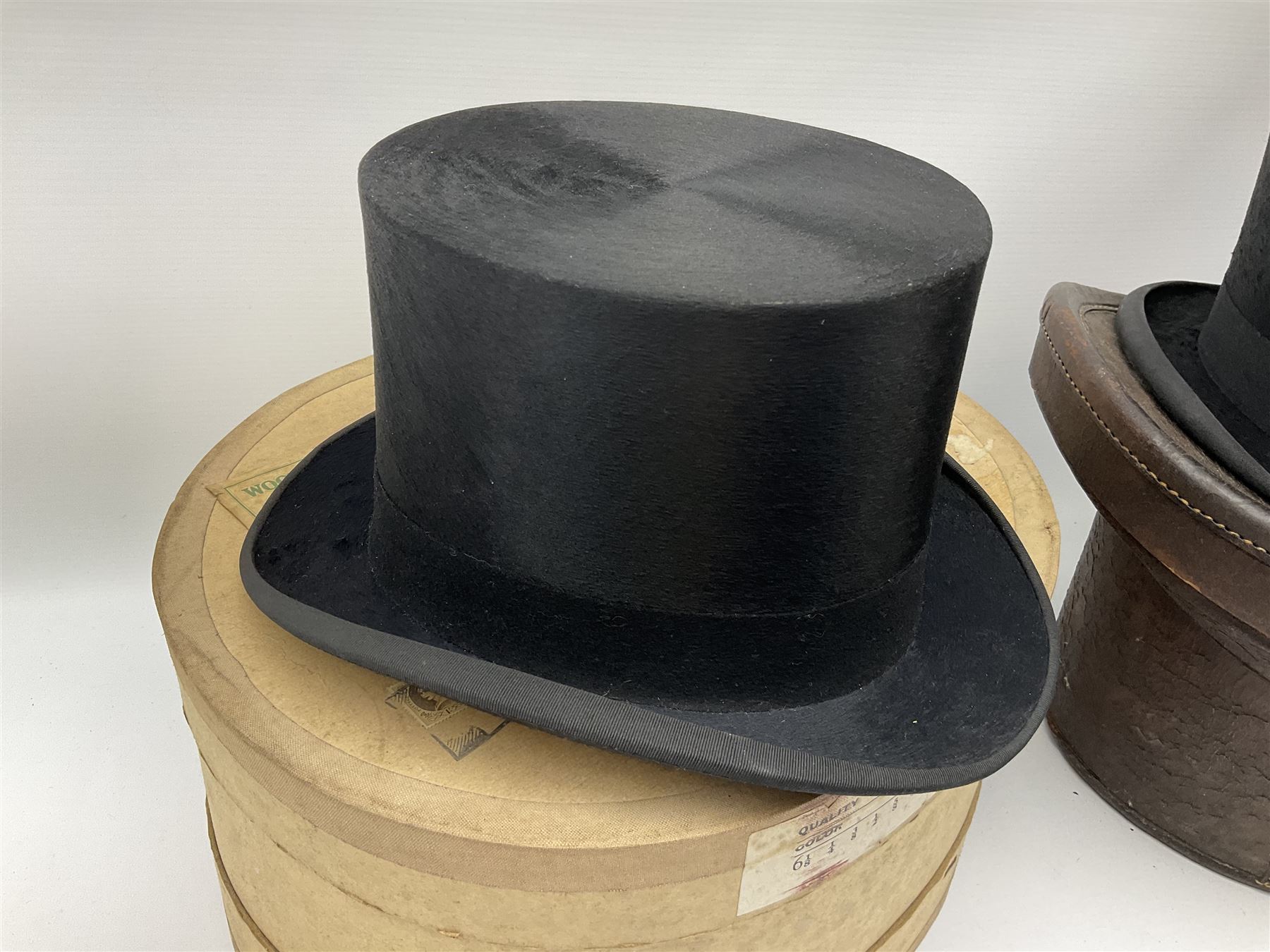 Top hat by Tress & Co London, in a  fitted leather leather case,  Top hat by Chapellerie Francaise. 