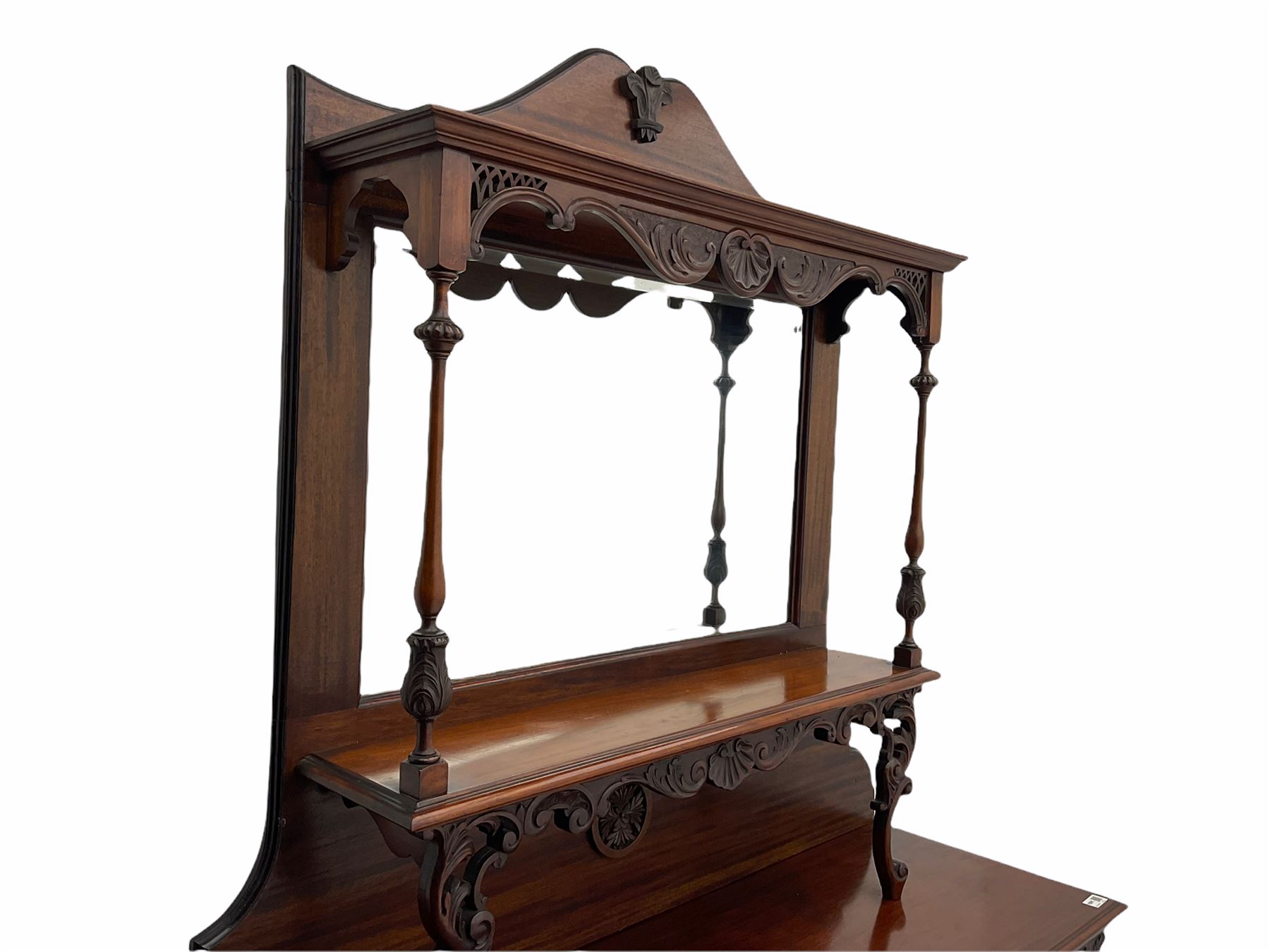 Late Victorian Empire style walnut mirror back sideboard, two glazed centre cupboards with drawer drawer