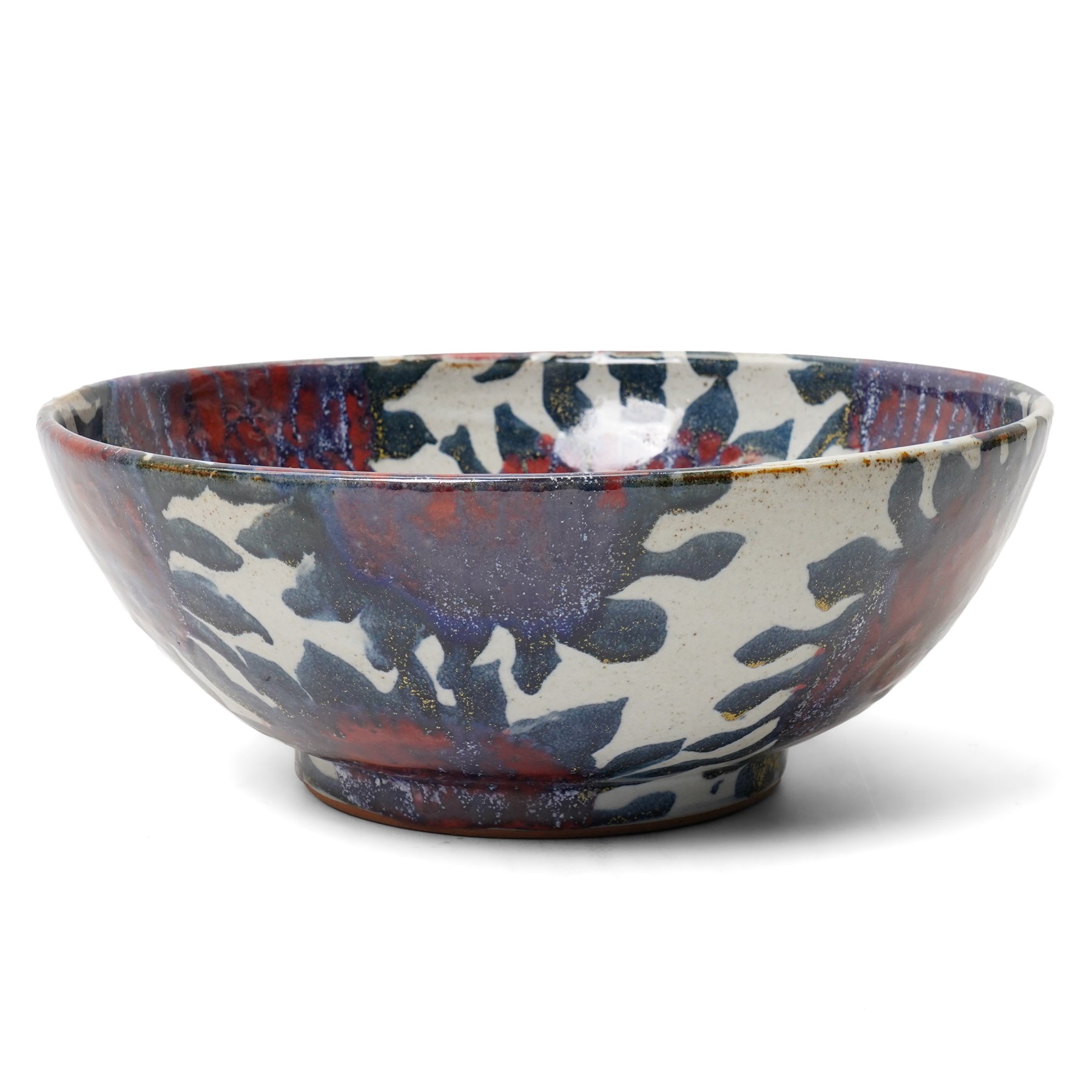 Sophie Hamilton (1963-): Sunflower bowl, decorated with blue and red sunflowers on a pale ground, unmarked, D34cm