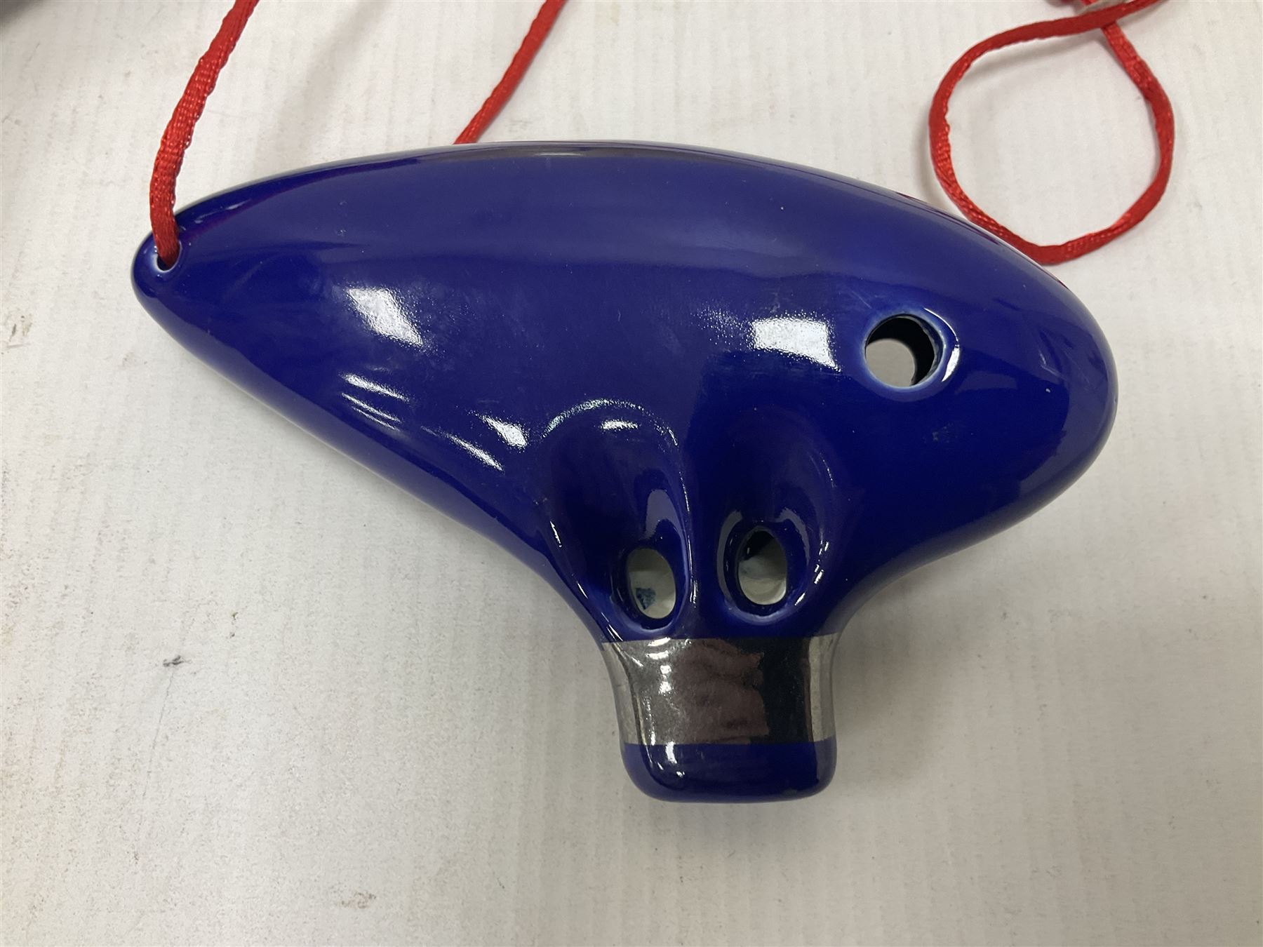 Four ocarinas three 10 hole ocarinas and one 16 hole double ocarina, three of which being from the Legend of Zelda franchise 