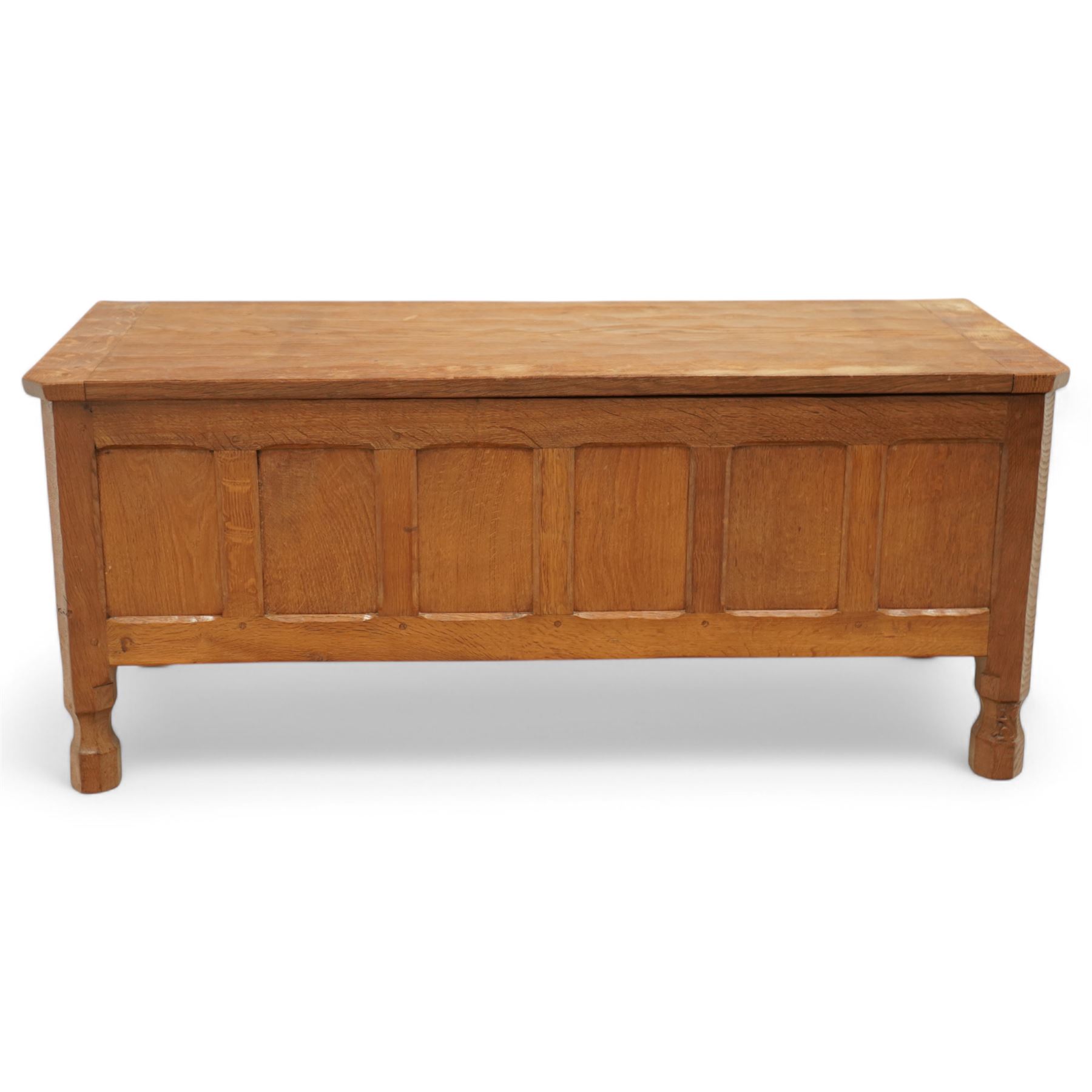 Squirrelman - oak six panel blanket box, on octagonal feet, squirrelman carving on the feet by Wilfred Hutchinson, Husthwaite, Thirsk