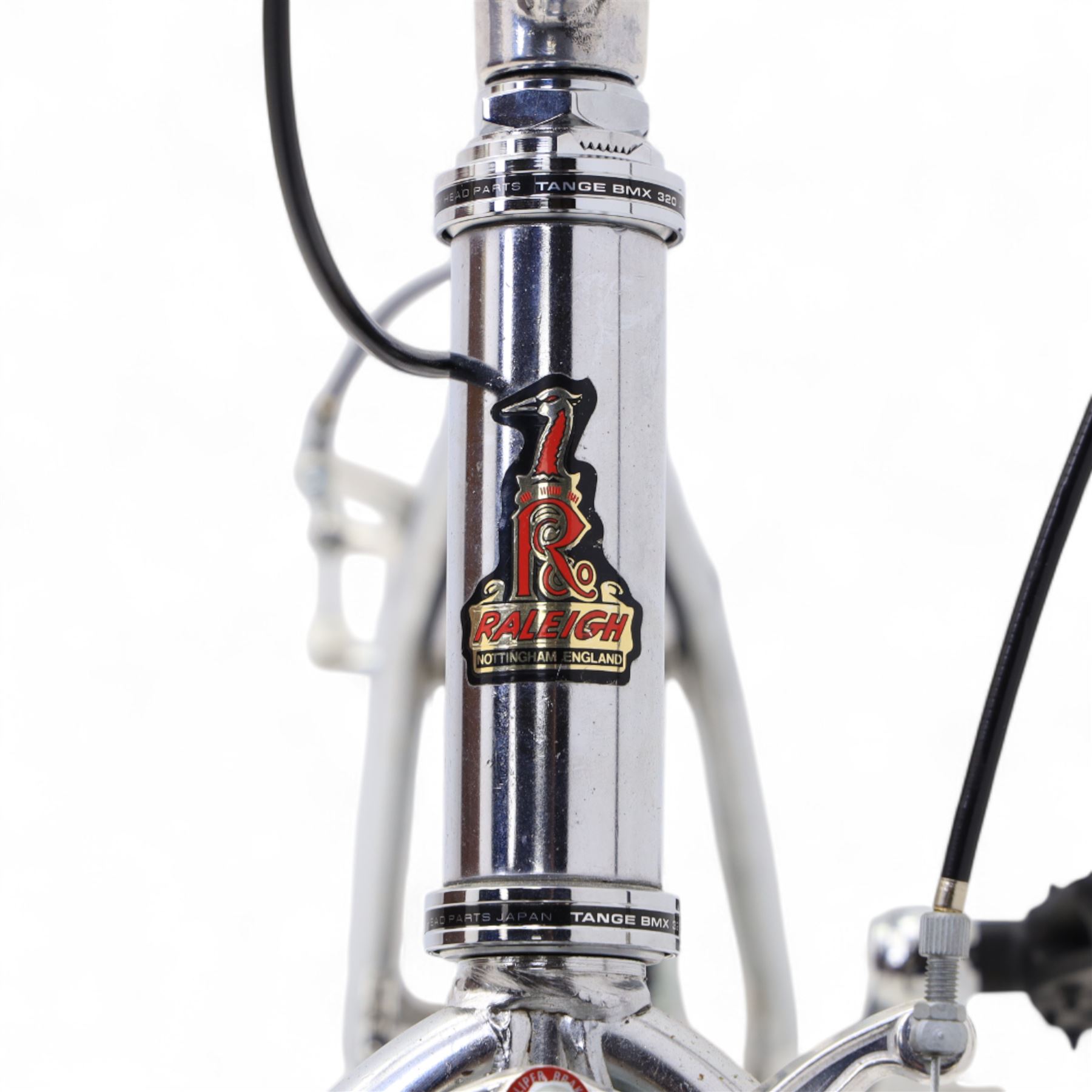 1980s Raleigh Cromo Burner BMX bike, with some original and some upgraded parts, including Oval Competition section frame and fork, Tange black rubber grips, Redline chain wheel, DMR Bikes V6 pedals and Duro Nylon F-075 tyres