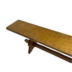 Gnomeman - adzed oak narrow bench, rectangular seat on shaped end supports united by pegged stretcher, carved with gnome signature, by Thomas Whittaker, Little Beck 