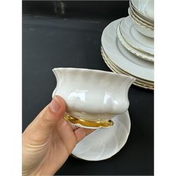 Royal Albert Val D'or part tea and dinner service, including two coffee pots, two teapots, milk jug, covered sucrier etc together with matching items 