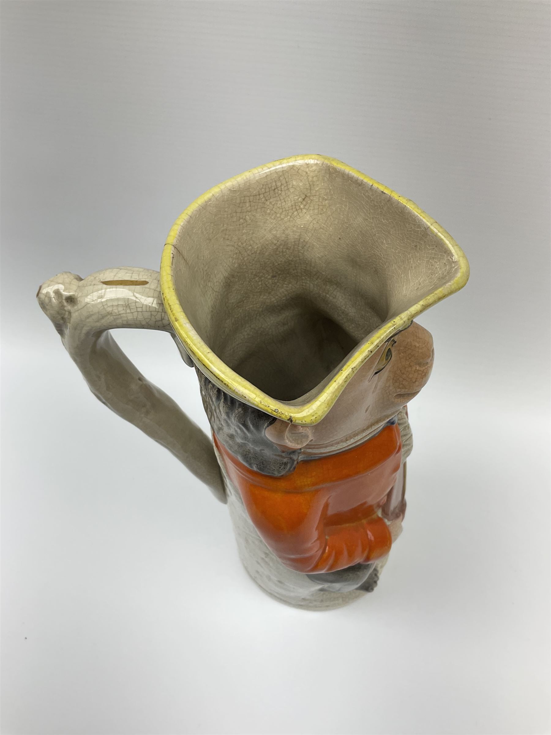 19th century Staffordshire Toby jug modelled as a monkey playing a cello H30cm. 