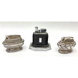 A Ronson Touch Tip chrome and bakelite table lighter, together with two silver plated Ronson table lighters. 