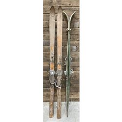 Two pairs of vintage skis, L207cm and 197cm