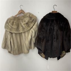 A ladies short brown mink fur coat, with leather trim, together with a further ladies short blonde mink fur coat. (2).