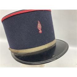 Mid 20th century French Ugeco Nantes first class dress navy blue uniform with ribbon bar with cap, and quantity of Sapeurs Pompiers patches, Sapeurs Pompiers de Caen belt buckle etc