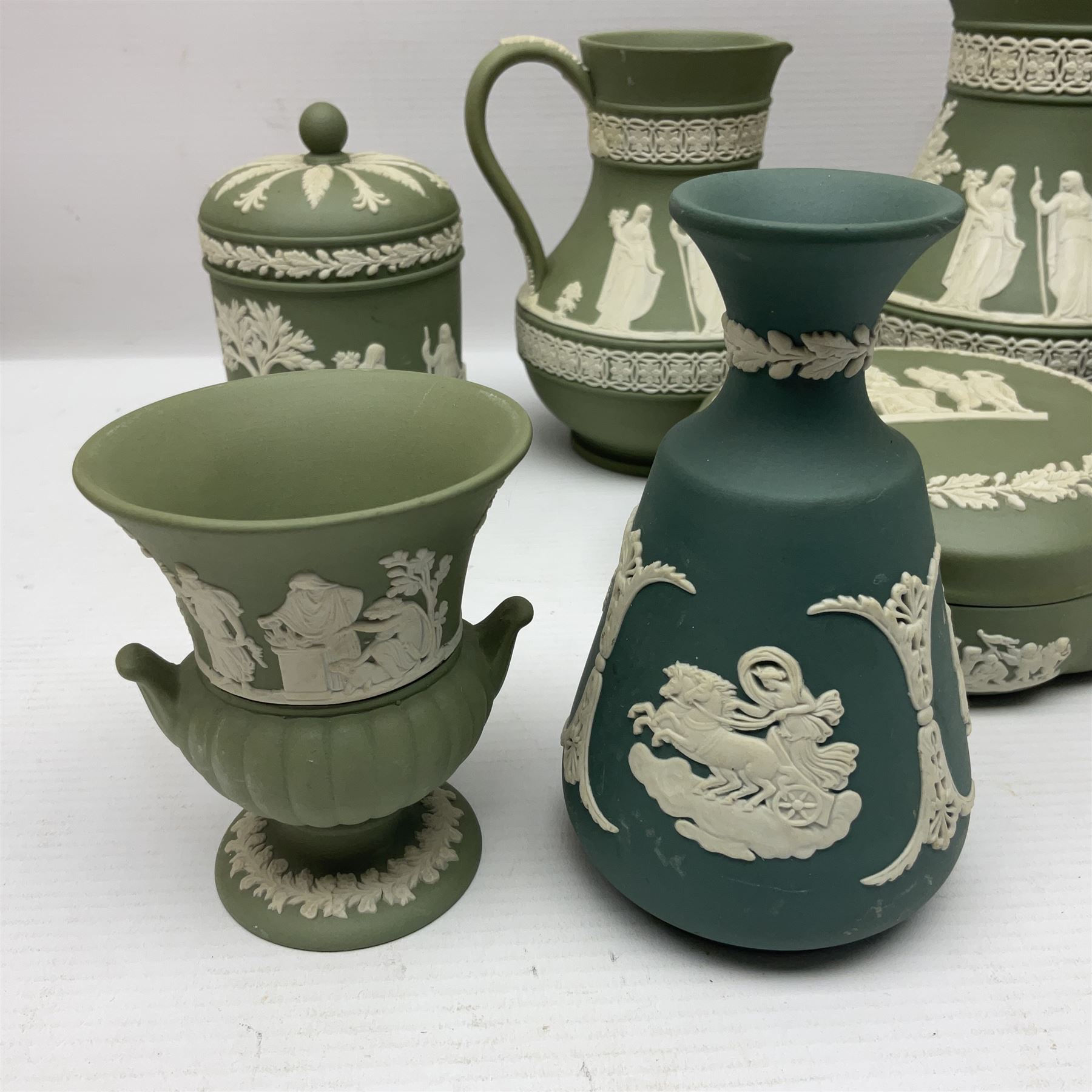 Collection of  Wedgwood green Jasperware, to include large jug, vases, trinket dishes, etc together with two teal Jasperware vases 