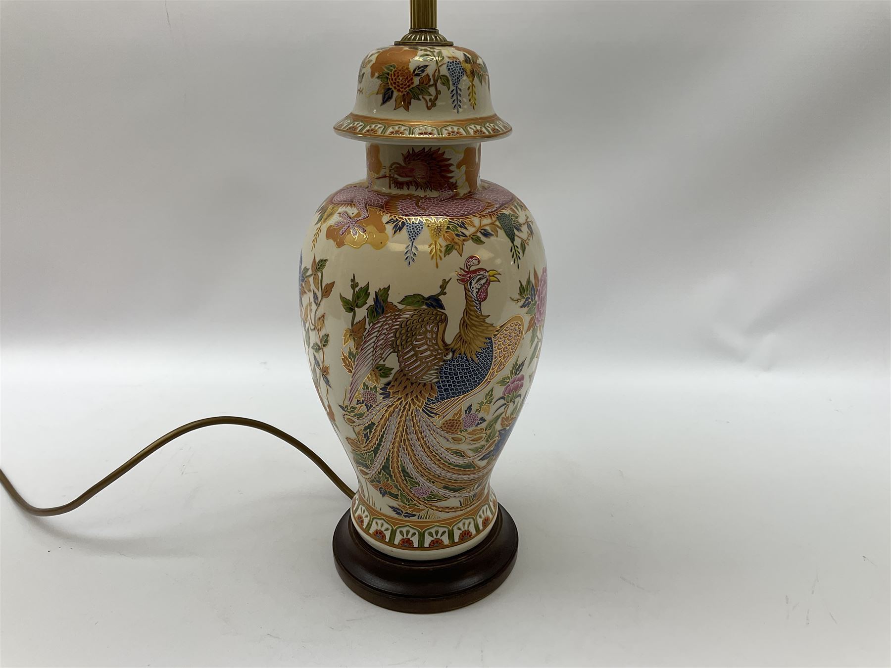 Table lamp of baluster form, decorated in the Oriental style with phoenix and dragon amidst blossoming flowers, with plated cream fabric shade, lamp base not including fixtures H35cm