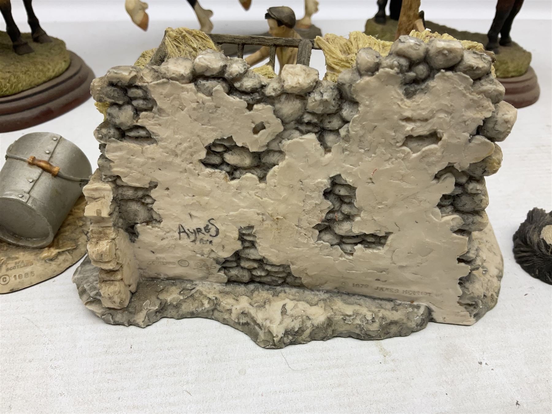Collection of Border Fine Arts figures, comprising Exmoor Stallion A4058, Highland Mare & Stallion A2691, Welsh Cob A20804, On The Farm A0167, calf figure with bucket and figure group of cow and farmer with cat and kittens (6)