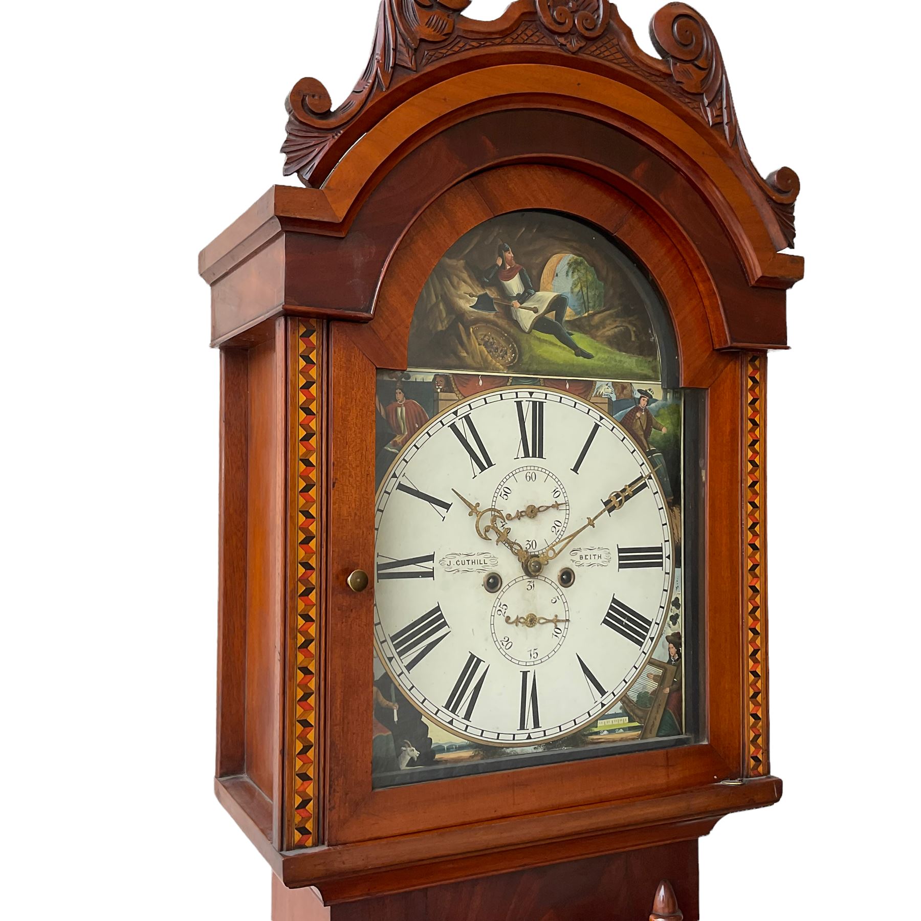 A Scottish longcase clock c 1890 in a contrasting light and dark mahogany veneered case, hood with a carved and crested pediment with a break arch door flanked by inlaid parquetry work, with a short trunk door and applied cushion mouldings, door flanked by half-turned applied columns on a square pediment with a recessed panel, fully painted break arch dial with spandrels representing the united kingdoms of Scotland, England, Ireland and Wales with a depiction of Robert Bruce to the arch, dial with Roman numerals ,minute track, subsidiary calendar dial and seconds dial with matching stamped brass hands, dial inscribed “J Cuthill, Beeth”, with an eight day striking movement,  striking the hours on a cast bell. With pendulum and two flat weights. 
John Cuthill is recorded as working as a watchmaker and clockmaker at 36 Eglington Street, Beith, Ayrshire. 1893.  
