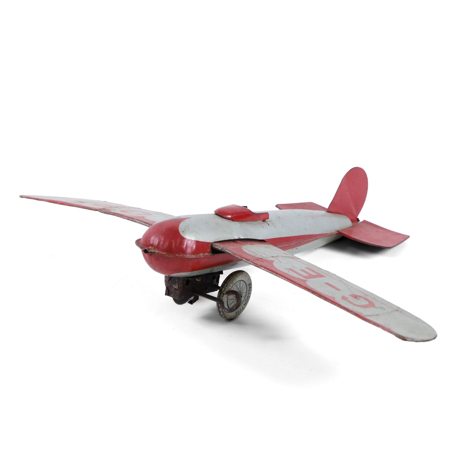 Four tinplate model aeroplanes, comprising Mettoy clockwork single-engined model no. K3520 in yellow with blue stripes and red engine cowl, Mettoy clockwork monoplane with silver and red lithographed body, Wells of London clockwork aeroplane no. 301 in green with lithographed details and a  small German bi-plane in yellow, three clockwork examples with key