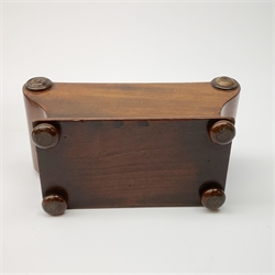 An early 19th century Regency style mahogany trinket box, of sarcophagus form with scroll ends and raised upon compressed bun feet, the lift off cover with traces of needle work, L17cm, together with a Georgian mahogany and strung tea caddy, of rectangular form with bone escutcheon, L20.5cm. 