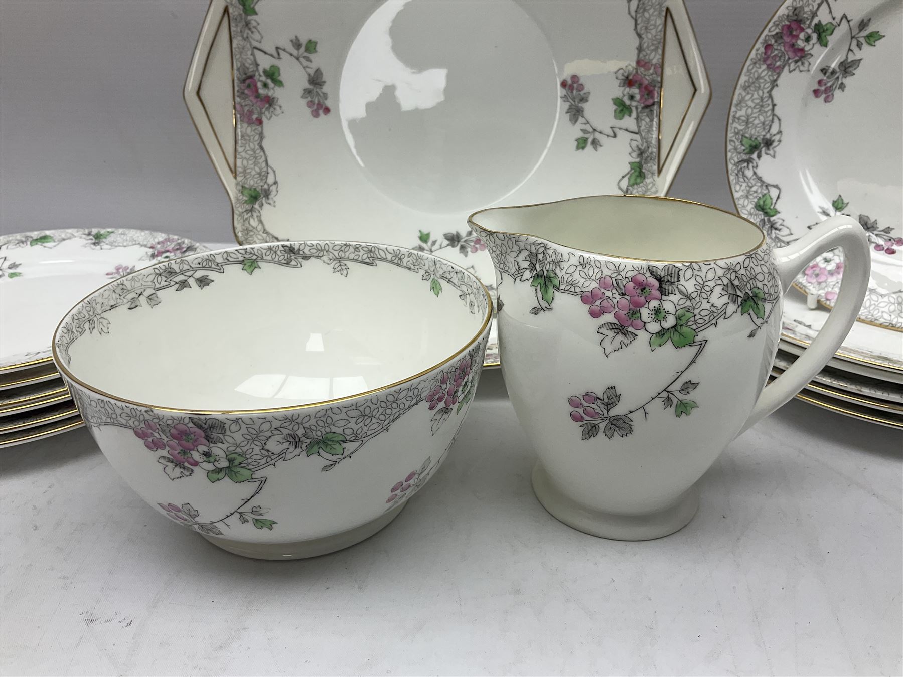 Shelley Bramble Rose pattern tea service, comprising milk jug, open sucrier, ten cups and twelve saucers, twelve dessert plates and two cake plates (38)