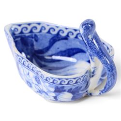 Early 19th century Spode butter boat, of leaf shaped form with high curved open handle, transfer printed with flowers, H5cm L8cm