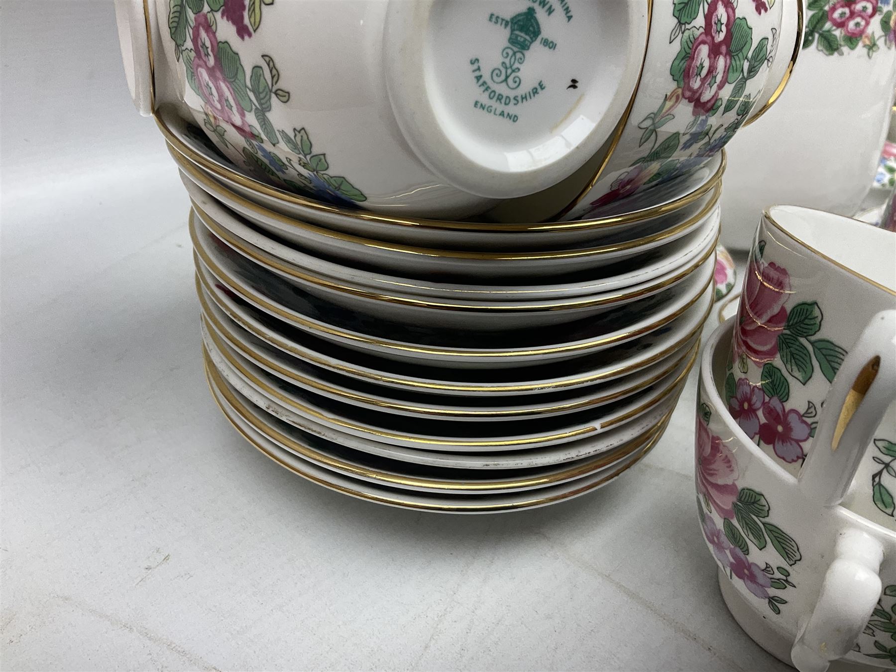 Crown Staffordshire Thousand Flowers pattern part tea service, to include teapot, two open sucriers, eighteen cups, fifteen saucers etc (57)