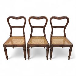 Gillows - Set of six mahogany dining chairs, each with curved top rail carved with floral medallion and scroll detail, fluted front supports, caned seats, the seat rail underside stamped HH identified as H. Howse an apprentice cabinetmaker at Gillows.