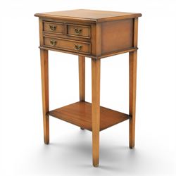 Georgian design mahogany lamp table, fitted with three small drawers, raised on square supports united by a full length undertier