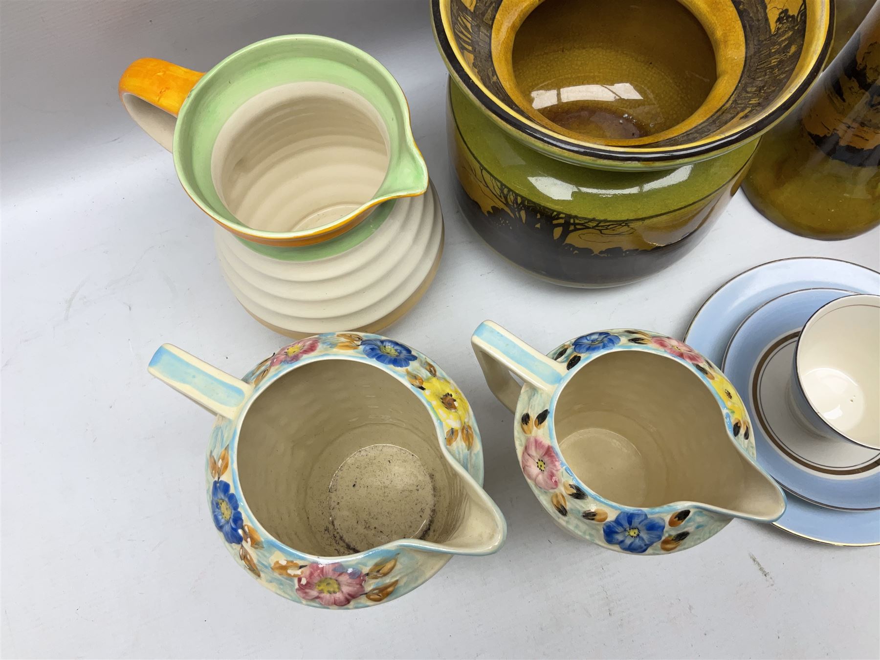 Royal Doulton wide rimmed jardinière, together with two Royal Doulton jugs, Arthur Wood jugs etc