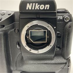 Canon EOS 1n Digital camera body, serial no. 260436, with 'Canon Zoom Lens EF 35-80mm 1:4-5.6 II Canon Inc. 52mm' lens, Kodak Professional DCS 520 digital module, and charger, serial no. K520C03165, together with Nikon F5 camera body with Kodak Professional DCS 760 digital module and charger, serial no. K760C03802