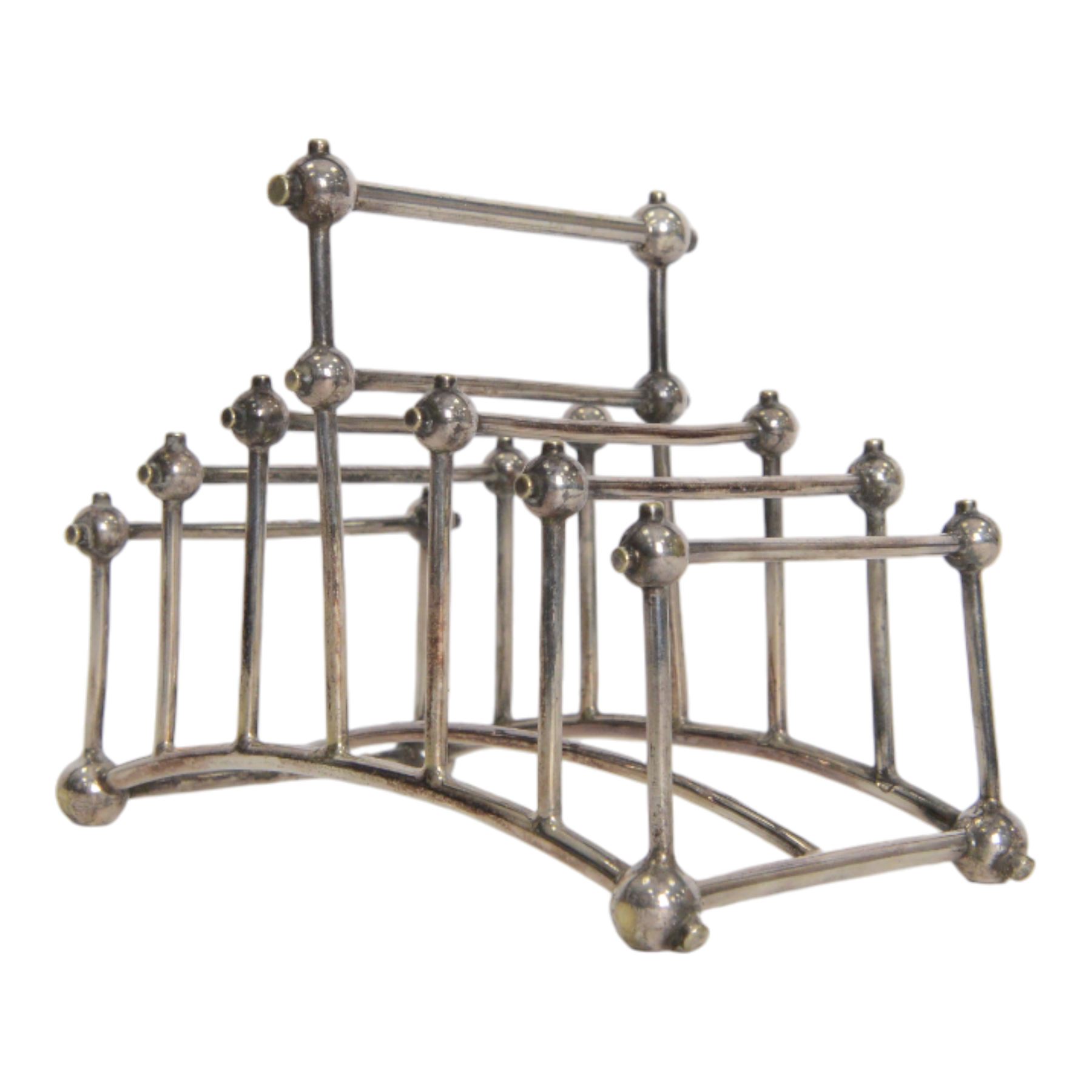 Christopher Dresser (1834-1904) for Hukin & Heath, silver plated six division bridge toast rack, circa 1880, Stamped makers marks and model number 2554, H12cm