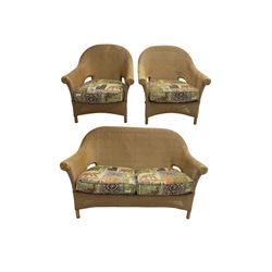 Three-piece 20th century cane conservatory suite - two seat sofa (W145cm D80cm H95cm) and pair matching armchairs (W5cm) with loose seat cushions in elephant design fabric