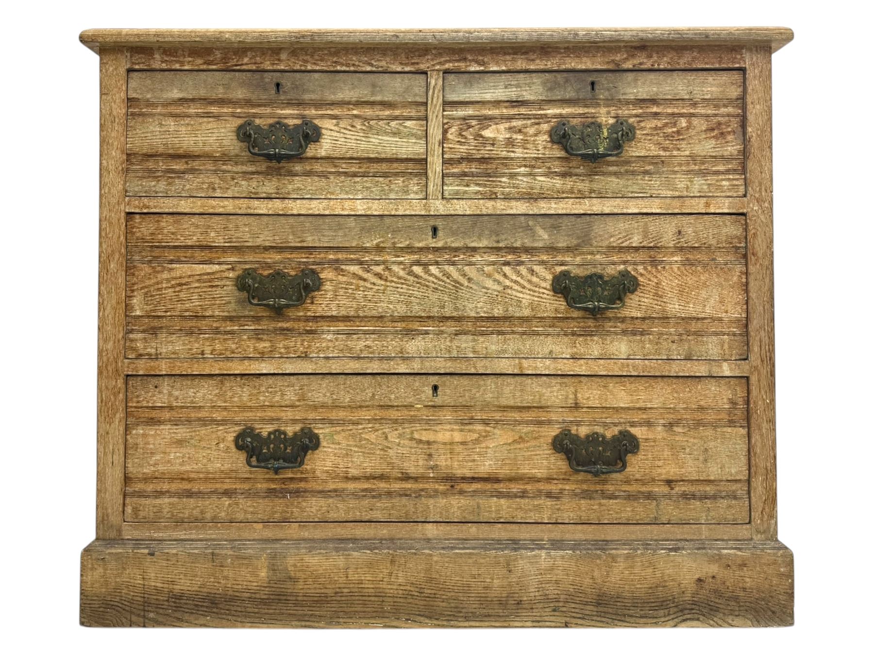 19th century oak chest of drawers, rectangular moulded top over two short and two long drawers, on plinth base (W99cm, D53cm, H81cm); early 20th century glazed mahogany display cabinet; Edwardian mahogany revolving bookcase (3)