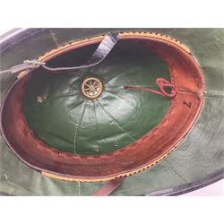 Police - Victorian turned hardwood truncheon with traces of decoration and VR cypher L42cm; Humberside Police helmet with Queens Crown helmet plate; hand lamp inscribed 'The Inspector'; and small pair of pewter figures of police officers (5)