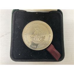 Limited edition Spode Green Howard's twin handled loving mug, no 205/300, with certificates, together with a Green Howards cased Tercentenary medal (1688-1988), cap badge and embroidered patch, largest H11.5cm