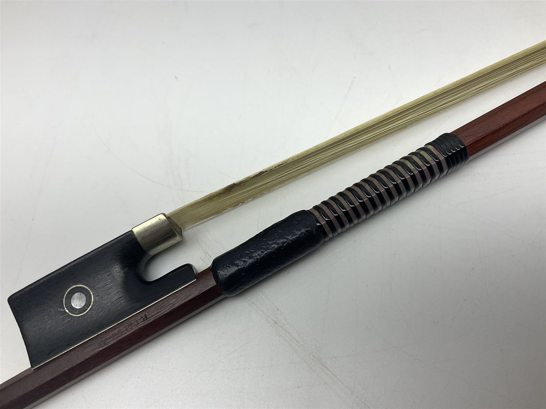 Nickel mounted pernambuco violin bow stamped R. Paesold L73.5cm